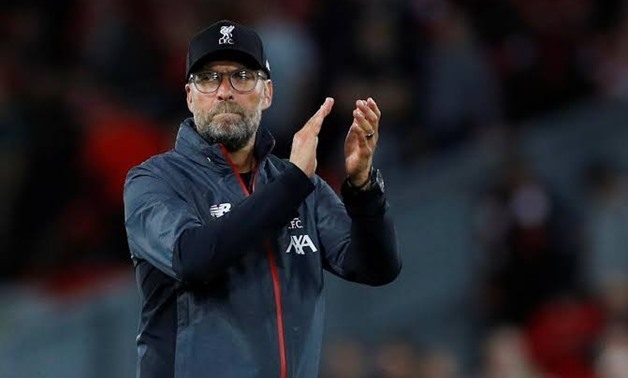 Soccer Football - Premier League - Liverpool v Norwich City - Anfield, Liverpool, Britain - August 9, 2019 Liverpool manager Juergen Klopp applauds their fans as he celebrates after the match REUTERS/Phil Noble