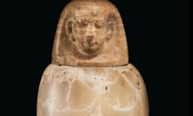 One of the ancient Egyptian Canopic containers set for sale in Christie’s Auction House - ET