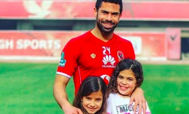 Ahmed Fathy with his two daughters - Photo via Ahly SC Facebook page