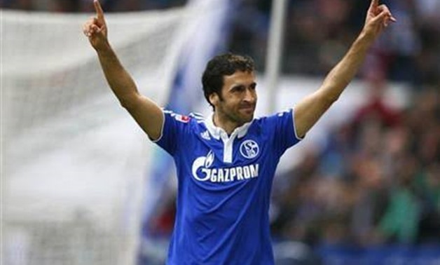 Raul of Schalke 04 celebrates his second goal against Hanover 96 during their German first division Bundesliga soccer match in Gelsenkirchen, April 8, 2012. REUTERS/Kai Pfaffenbach