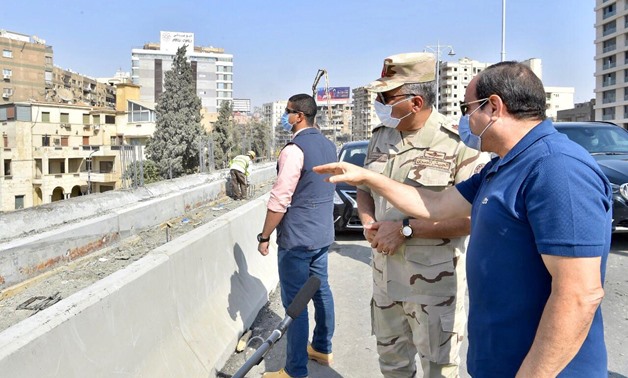 FILE - Egypt’s President Abdel Fattah El Sisi inspects construction work in some road and bridge projects in eastern Cairo – Press photo