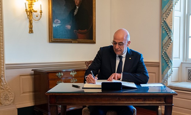 Greek Foreign Minister Nikos Dendias signs Secretary Pompeo's guestbook before their meeting at the U.S. Department of State in Washington, D.C., on July 17, 2019. [State Department photo by Ron Przysucha/ Public Domain] Via Commons Wikimedia
