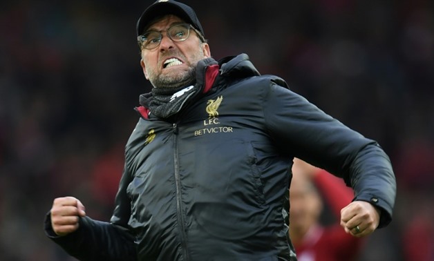 AFP/File / Paul ELLIS
Jurgen Klopp has told Liverpool fans to cheer them to the title from home

Jurgen Klopp has told Liverpool fans to cheer them to the title from home
