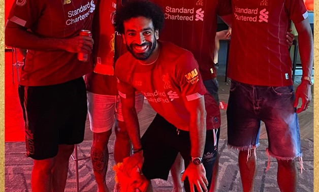 Salah celebrates the league title with his teammates, photo courtesy of Liverpool Twitter account 