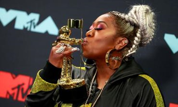 FILE PHOTO: 2019 MTV Video Music Awards - Photo Room - Prudential Center, Newark, New Jersey, U.S., August 26, 2019 - Missy Elliott poses backstage with her Michael Jackson Video Vanguard award. REUTERS/Andrew Kelly.