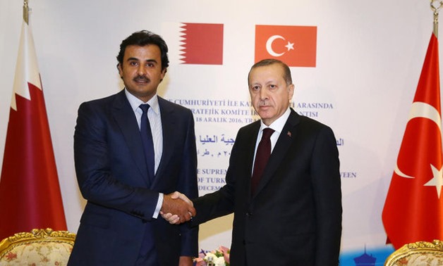 Tamam (L) and Erdogan (R)- Reuters