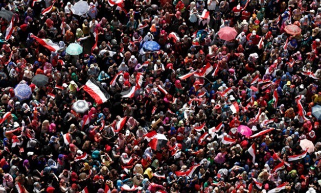 Protestors in Tahrir Square in Cairo July 3, 2013 – Reuters/Steve Crisp
