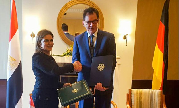 Sahar Nasr and Gerd Müller during the signing ceremony - courtesy International Cooperation and Investment Ministry