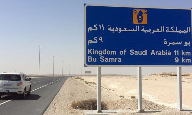 A road sign is seen near Abu Samra border crossing to Saudi Arabia, Qatar June 12, 2017 - REUTERS