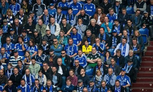 Borussia Dortmund fan sits with Schalke supporters – Marc Bartra Official Twitter 