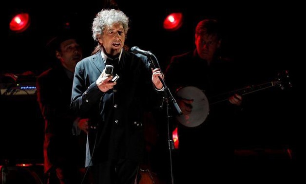 Singer Bob Dylan performs during a segment honoring Director Martin Scorsese, recipient of the Music+ Film Award, at the 17th Annual Critics' - REUTERS/Mario Anzuoni