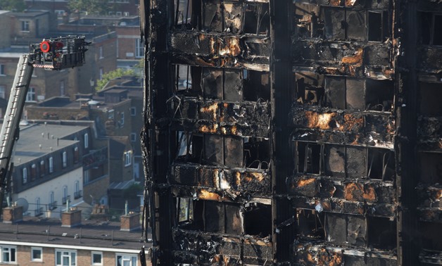Damage is seen to a tower block which was destroyed in a fire disaster, in north Kensington, West London, Britain June 15, 2017. REUTERS