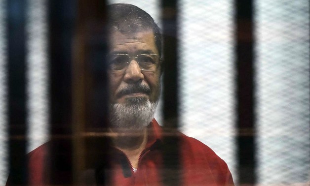 Former President Mohamed Morsi during his trial- File photo