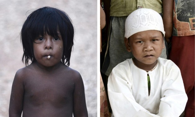 A young boy (L) from the nomadic "Orang Rimba" tribe -- whose name translates as "jungle people", and another boy (R) whose family had converted to Islam - AFP/GOH CHAI HIN