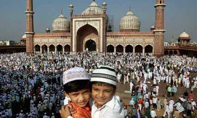 Children wishing each other Eid Mubarak