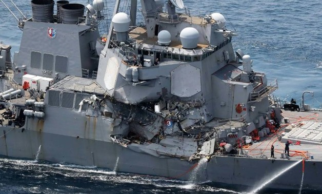 Damage is seen on the guided missile destroyer USS Fitzgerald off Japan's coast, after it collided with a Philippine-flagged container ship - AFP