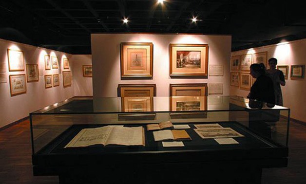 Paintings displayed in the exhibition - File photo