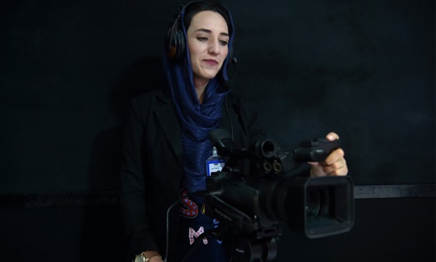 Afghan women are redrawing the media landscape in the deeply conservative country with the launch of a new magazine and a television channel - AFP / SHAH MARAI