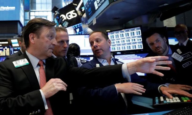 Traders work on the floor of the New York Stock Exchange (NYSE) in New York, U.S., June 2, 2017. REUTERS/Brendan McDermid