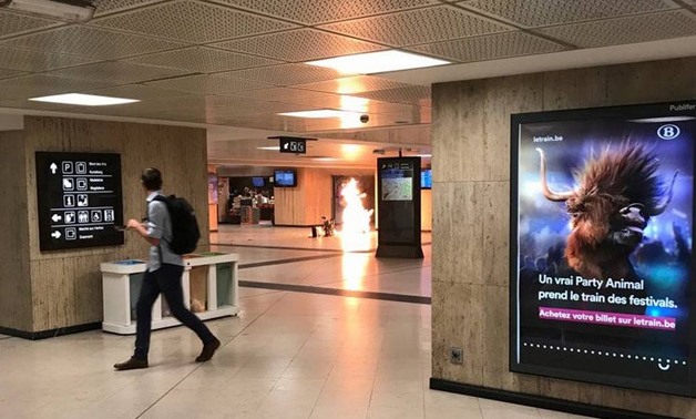 Fire is seen at Brussels central station in Brussels, Belgium June 20, 2017 – Courtesy Twitter/@remybonnaffe/via REUTERS