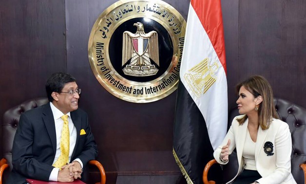 Minister of Investment and International Cooperation Sahar Nasr (R) and Indian Ambassador Sanjay Bhattacharyya (L) in a meeting on Wednesday - Press Photo