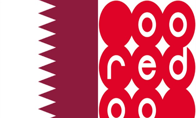 Ooredoo flag and Qatar flag File Photo