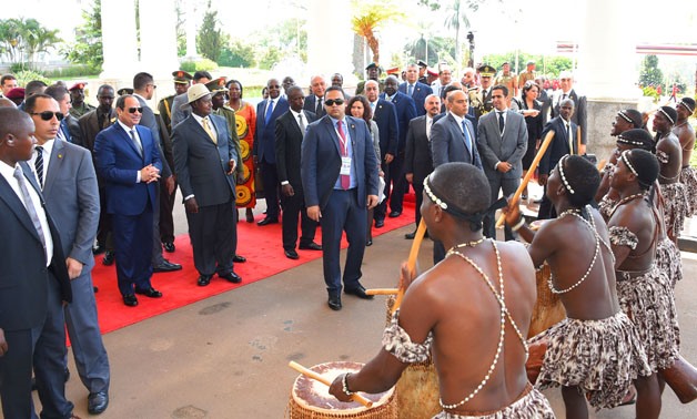 President Abdel Fatah al-Sisi receives warm welcome in Uganda in December 2016 - press photo