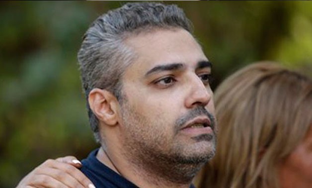 Canadian Al Jazeera English Journalist Mohamed Fahmy Speaks To Cameramen After Being Released From Torah Prison In Cairo, Egypt - AP/ File photo
