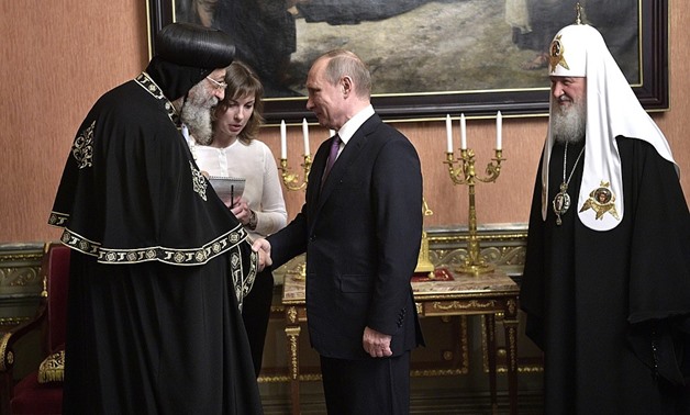 Pope Tawadros and Putin during the visit - Press photo