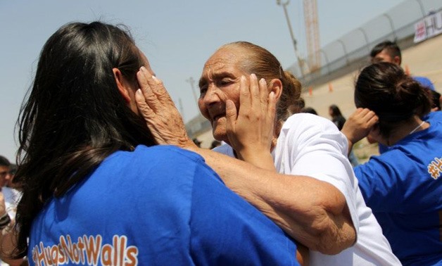 Families separated by the US-Mexico border are reunited for a few minutes in a "Hugs Not Walls" event in Ciudad Juarez, Mexico on June 24, 2017- AFP