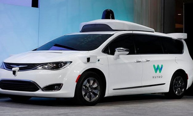 WAYMO TO HIT THE ROAD: A Chrysler Pacifica hybrid outfitted with Waymo's suite of sensors and radar is shown at the North American International Auto Show in Detroit. Image: AP / /Paul Sancya