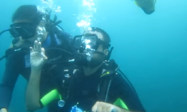 Srin Madipalli diving in Bali - Still image from Youtube video