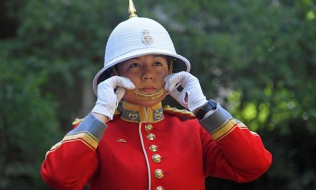 Captain Megan Couto of the 2nd Battalion, Princess Patricia's Canadian Light Infantry, poses for a photograph as she prepares to command the Queen's Guard - REUTERS/Toby Melville