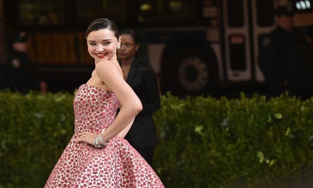 In this photo, Miranda Kerr attends the 'Rei Kawakubo/Comme des Garcons: Art Of The In-Between' Costume Institute Gala at Metropolitan Museum of Art on May 1, 2017 in New York City. Mike Coppola/Getty Images for People.com/AFP