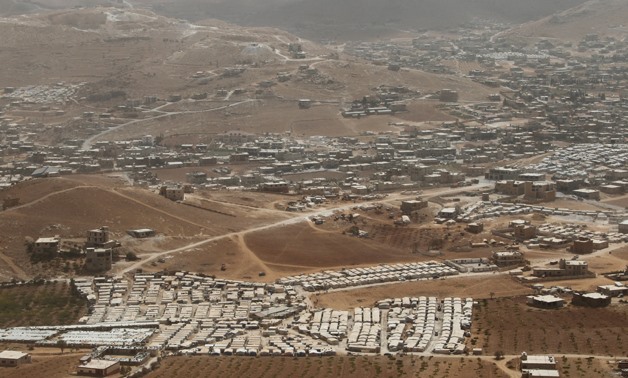 A general view shows Syrian refugee camps dotted in and around the Lebanese town of Arsal, near the border with Syria, Lebanon September 21, 2016. REUTERS