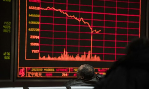 Most Asian and European markets ended the week in the red, but Wall Street held on to modest gains - AFP
