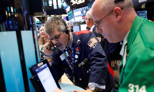 Traders work on the floor of the New York Stock Exchange REUTERS/Lucas Jackson
