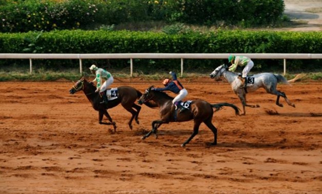 Jockeys compete during a horse race at Beirut Hippodrome, Lebanon, April 30, 2017. REUTERS/Jamal Saidi