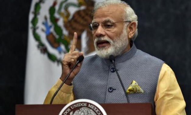 Prime Minister Narendra Modi held a special midnight session of parliament to launch the new goods and services tax (GST) which he called "good and simple". PHOTO: AFP