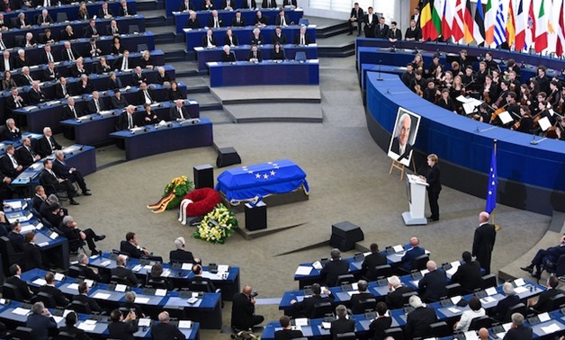German Chancellor Angela Merkel paying tribute to former chancellor Helmut Kohl in the European Parliament - AFP 