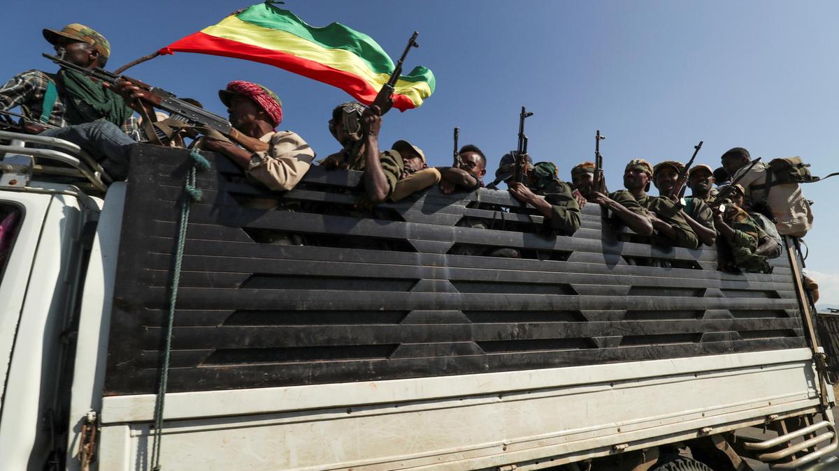 Members-of-Amhara-region-militias-ride-on-their-truck-as-they-head-to-face-the-Tigray-People-s-Liberation-Front-in-Sanja Members-of-Amhara-region-militias-ride-on-their-truck-as-they-head-to-face-the-Tigray-People-s-Liberation-Front-in-Sanja