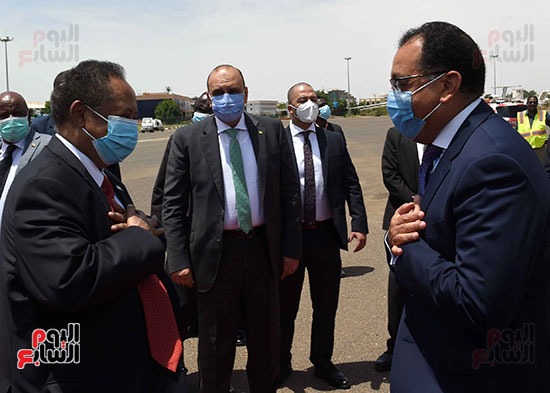 Madbouly and Hamdok greet each other without a handshake amid Covid-19 pandemic on Aug. 15, 2020 - Youm7