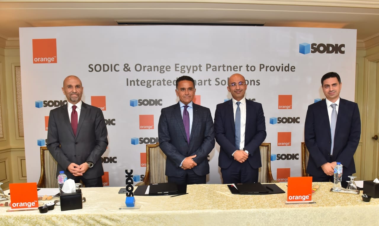 Eng. Yasser Shaker, CEO and Managing Director of Orange Egypt, and Eng. Magued Sherif, Managing Director of SODIC, Mr.Ahmed El Abd, Chief Commercial Officer at Orange Egypt, and Mr. Hisham Saleh, Chief Information Officer at SODIC.