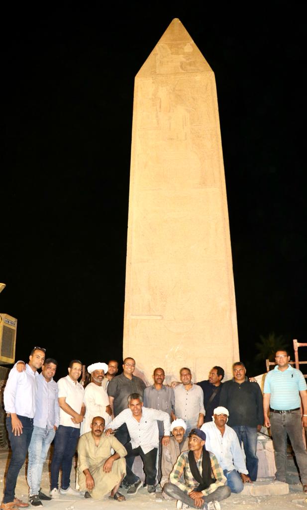 The team of restorers with the erected Hatshepsut Obelisk - Min. of Tourism & Antiquities