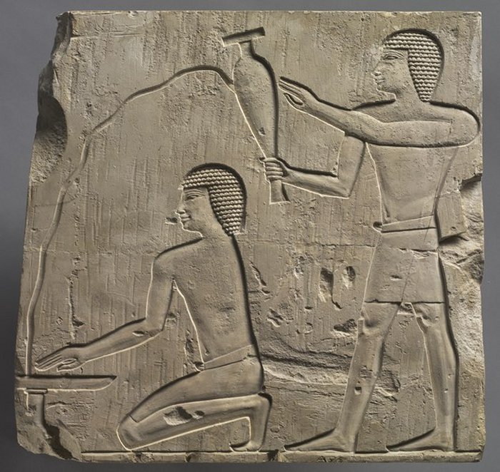 Ancient Egyptian priests performing funerary rites - social media