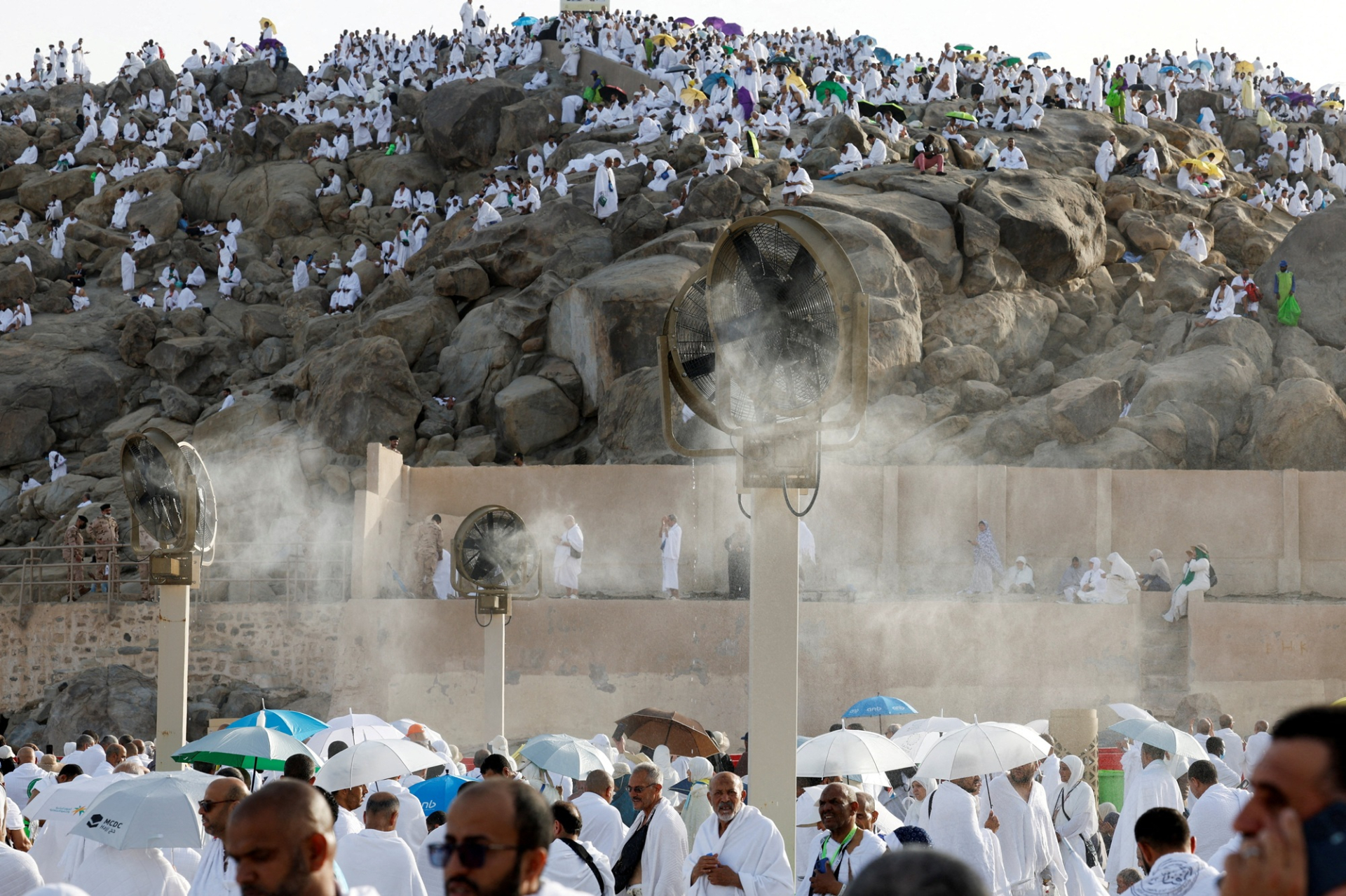 Pilgrims moving between holy sites during Hajj Pilgrims moving between holy sites during Hajj