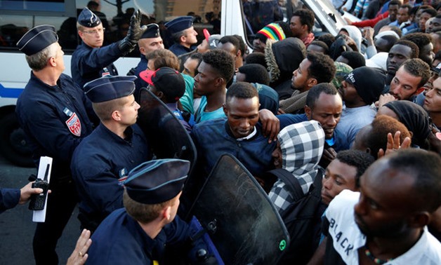 French police evict thousands of migrants  near the reception center for migrants and refugees at porte de la Chapelle, France, . REUTERSPascal Rossignol