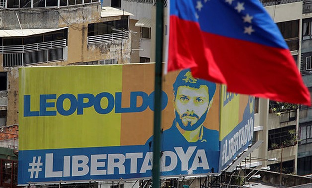 A billboard depicting jailed Venezuelan opposition leader Leopoldo Lopez is seen during a rally against Venezuela"s President Nicolas Maduro in Caracas, Venezuela, May 26, 2017 - REUTERS/Christian Veron