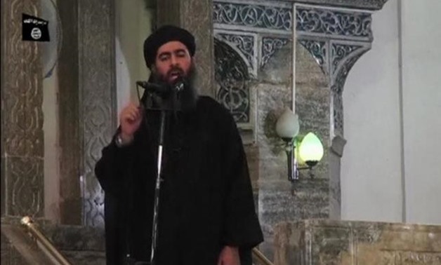 Abu Bakr al-Baghdadi at a mosque in the centre of Iraq's second city, Mosul, according to a video recording posted on the Internet in this still image taken from video - REUTERS/Social Media Website via Reuters TV