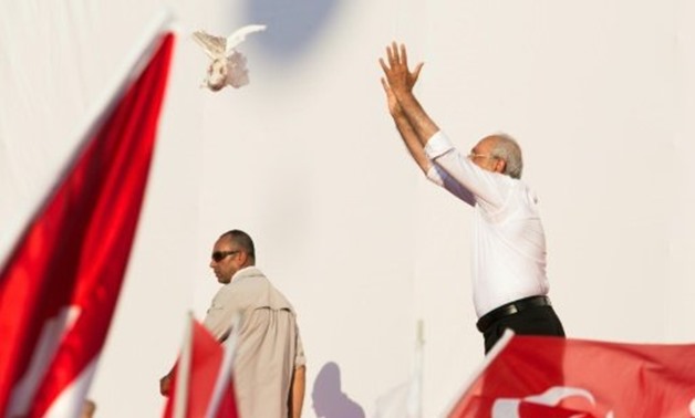 © AFP | Turkish opposition leader Kemal Kilicdaroglu, seen releasing a dove during Sunday's huge Istanbul rally, Monday visited jailed lawmaker Enis Berberoglu, whose plight his month-long "justice march" highlighted
